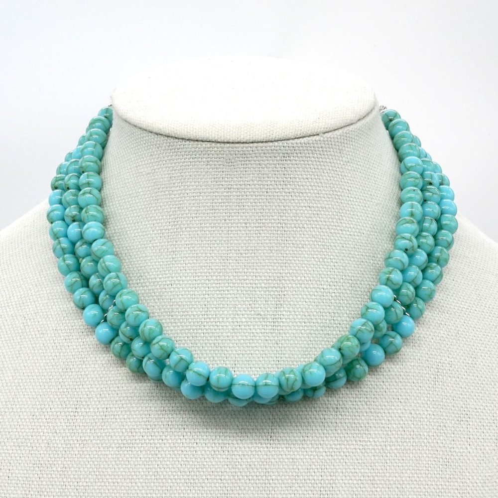 Turquoise 3 tier necklace with silver chain.